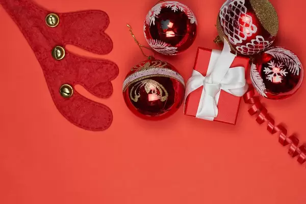 Xmas decorative background on red. Overhead view