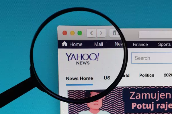 Yahoo! News logo under magnifying glass