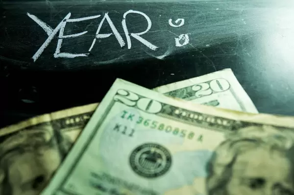 YEAR 2020 with dollar bills