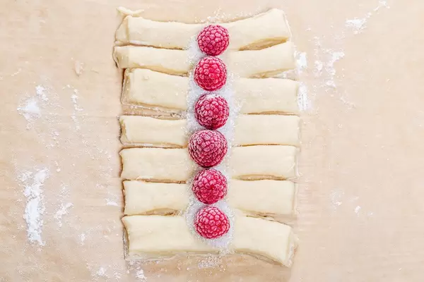 Yeast dough with fresh raspberries. Home baking