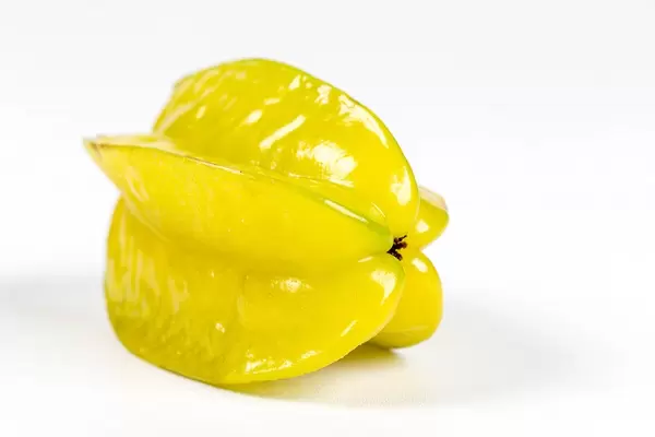 Yellow carambola on white background