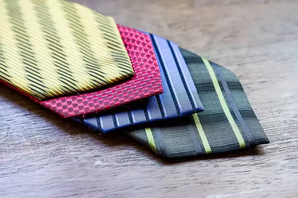 Yellow, red, blue, and green ties