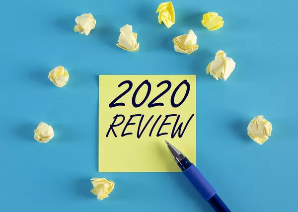 Yellow sticky note with 2020 Review text
