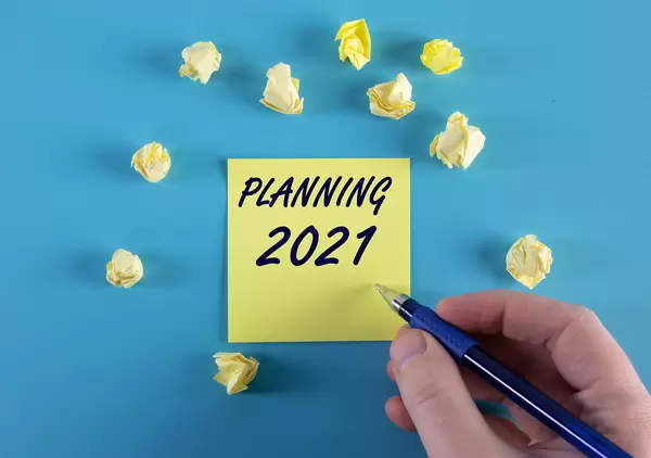 Yellow sticky note with Planning 2021 text