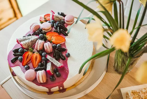 Yogurth Cake Filled With Berries, Jelly Beans, Papaya, Macaroons