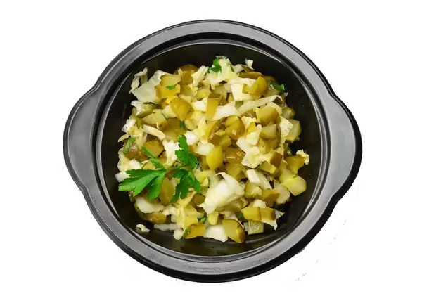 Young cabbage with pickled cucumber