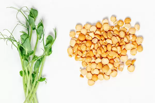 Young fresh pea sprouts and pea-grits on white background (Flip 2019)