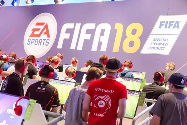 Young men at German games fair at a interactive gaming preview for Fifa18 by EA