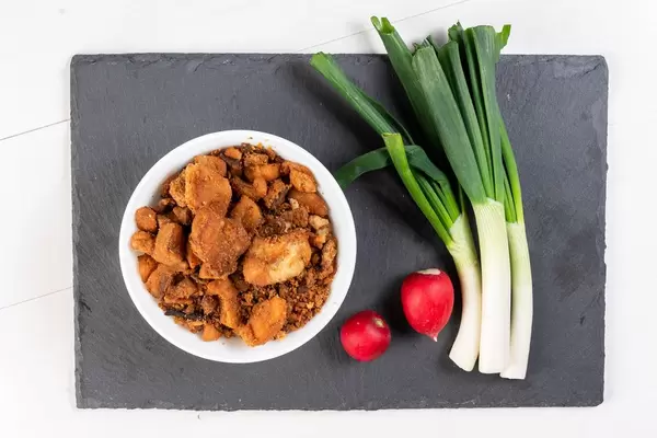 Young Onions Red Radishes and Pork Greaves on the black tray (Flip 2019)