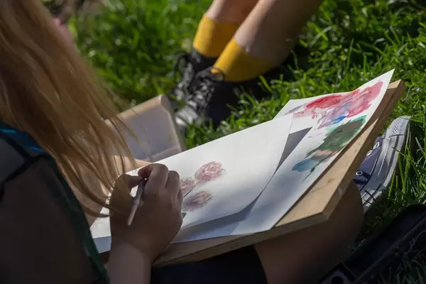 Young woman painting at Gorky Park