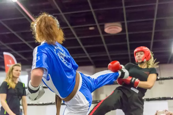 Young women during wun hop kuen do sparring