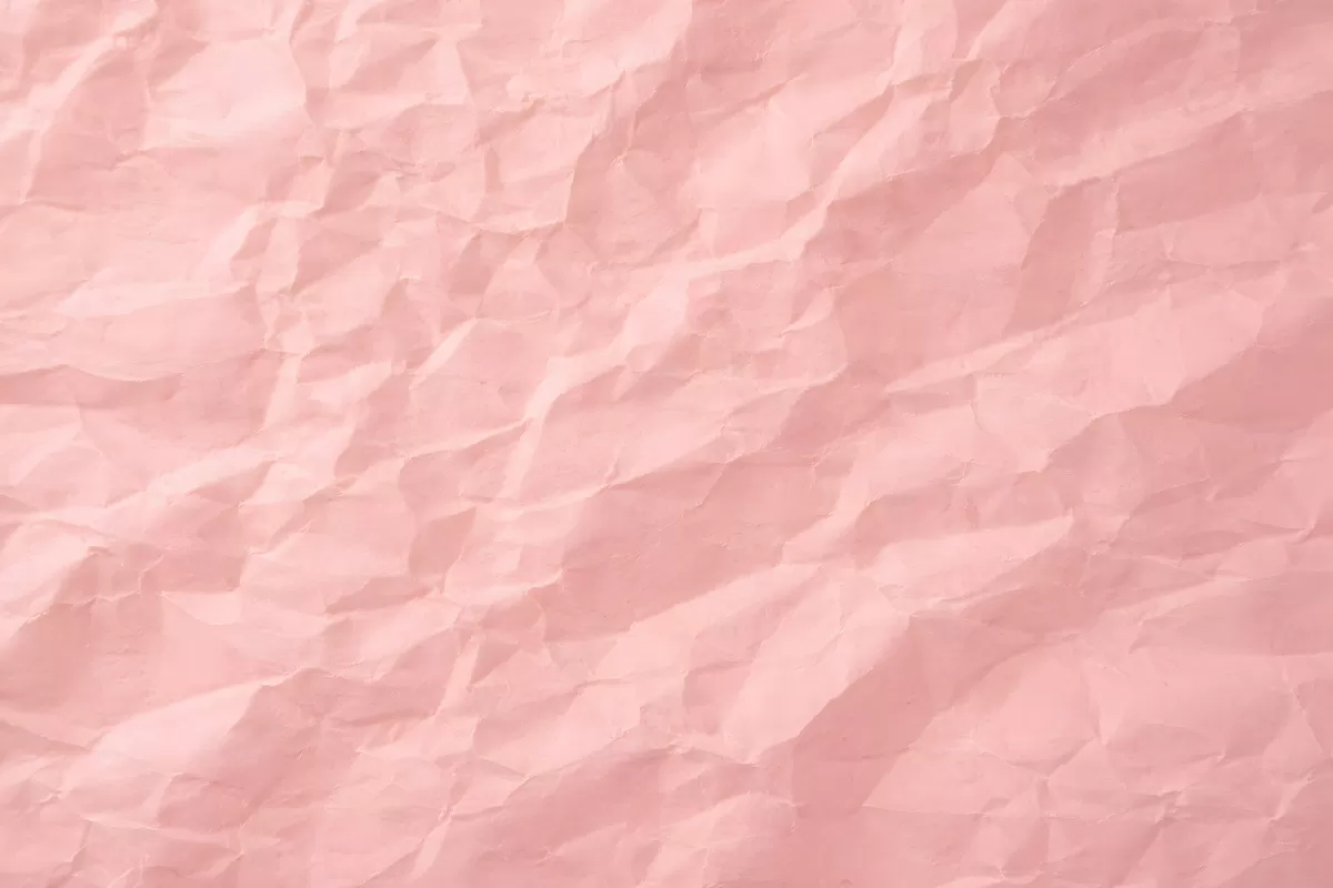 Zart geprägte rosa Papiertextur als Hintergrund