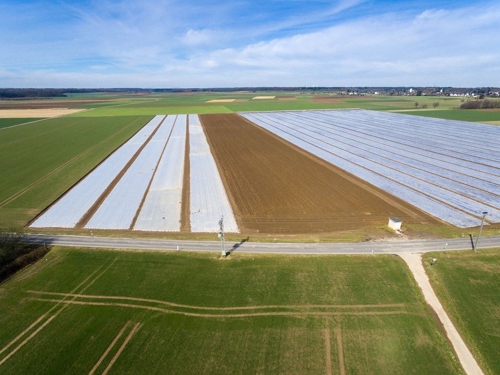 Aerial photo of fields under foil