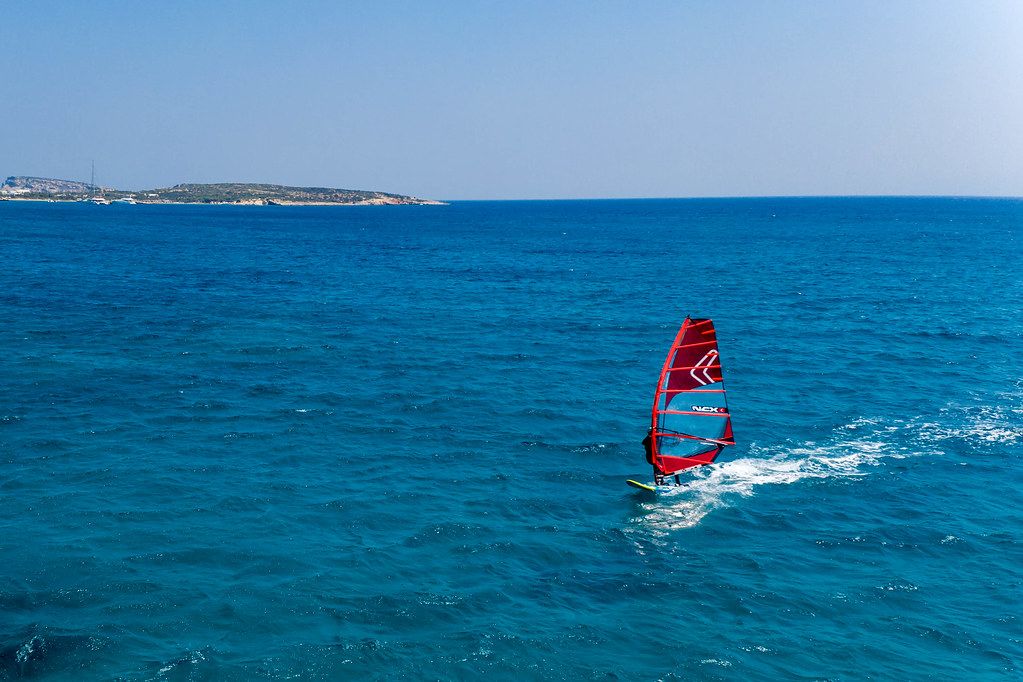 Aerial photo shows a windsurfer on the blue sea off Paros, Greece, in the Aegean Sea