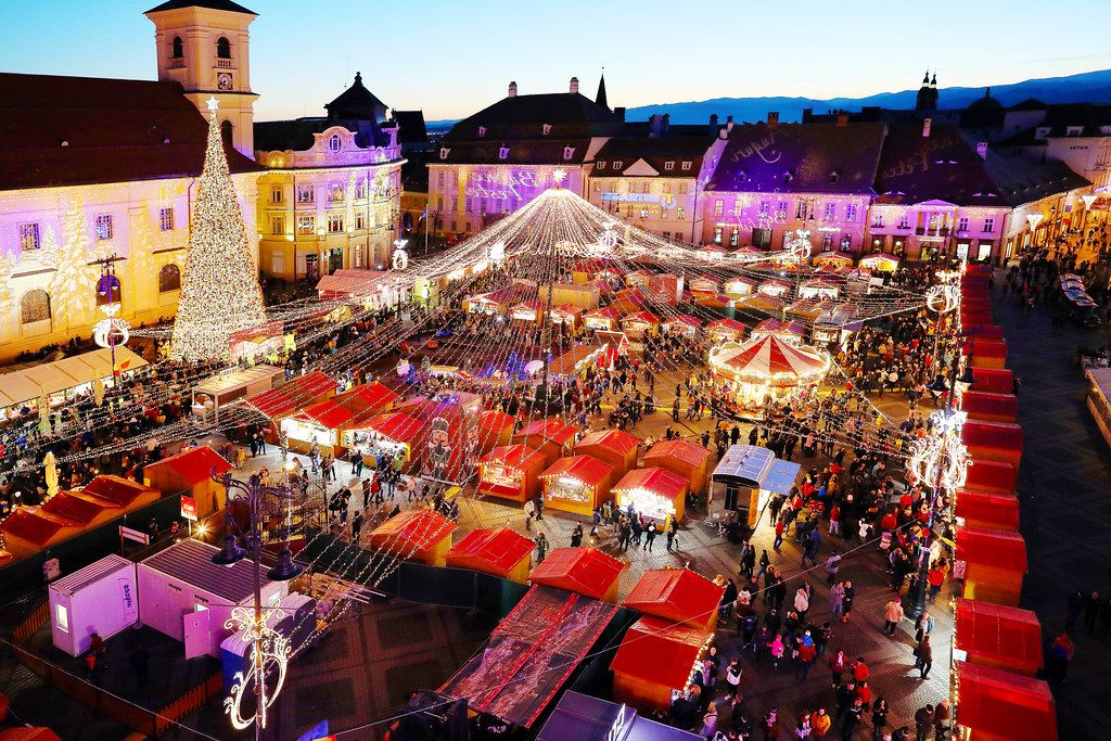 Aerial view of Sibiu Christmas market with Christmas tree and Carousel (Flip 2019)
