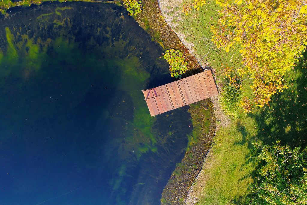 Aerial view of wooden pontoon by the lake