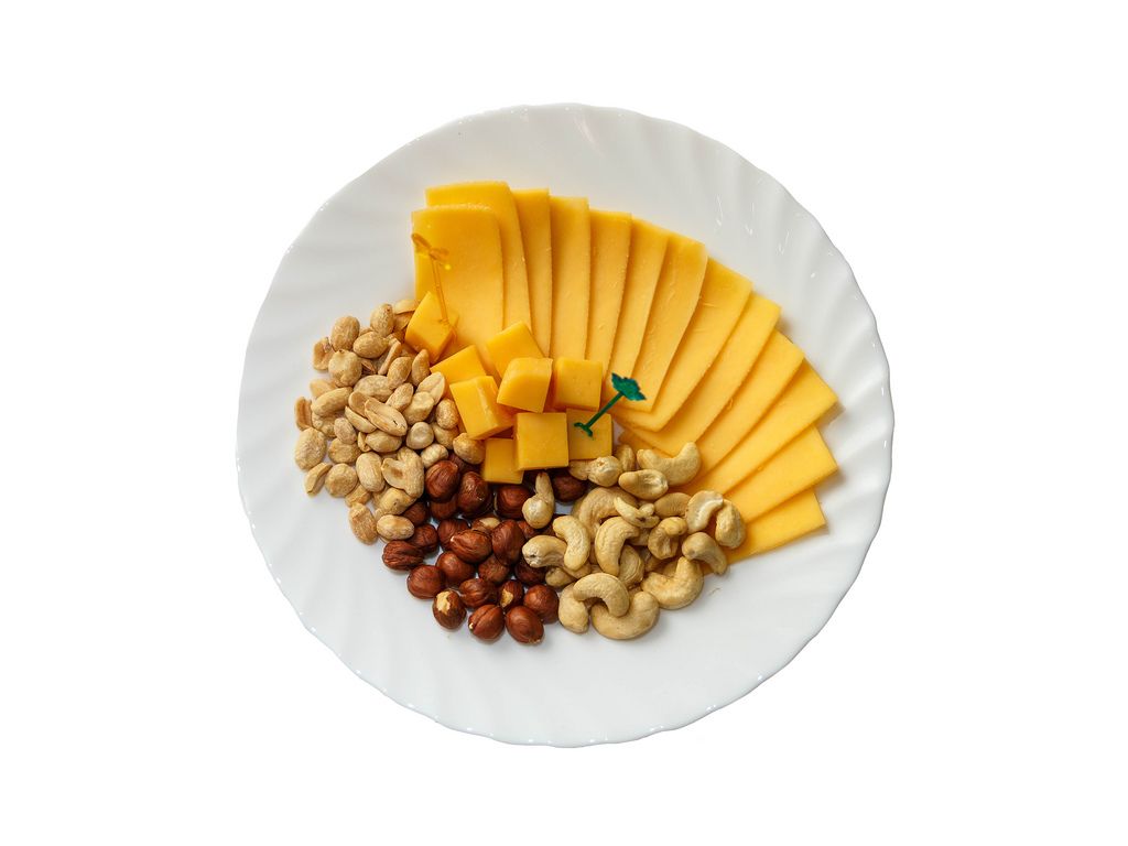 Assorted cheese and nuts in the plate on white background (Flip 2019)