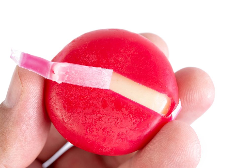 Babybel cheese in the hand