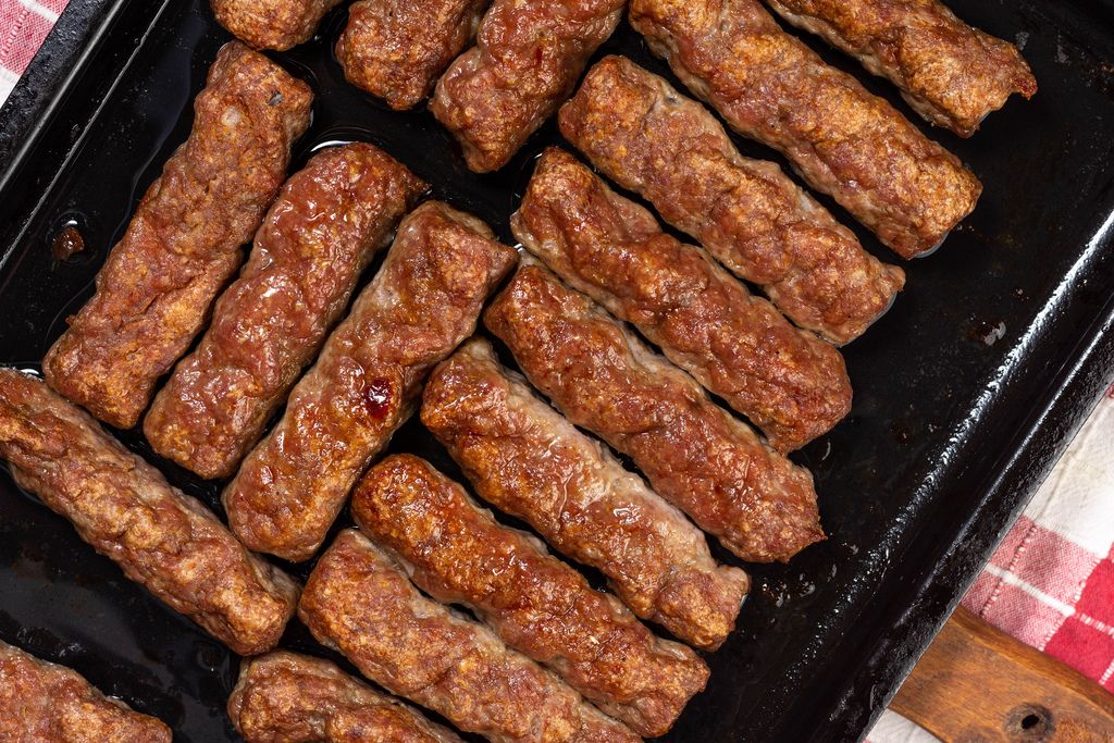 Baked minced meat Kebabs on the baking pan