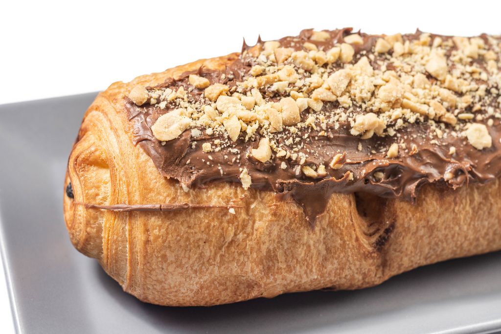 Bakery Pastry with Chocolate Cream and grated Hazelnuts