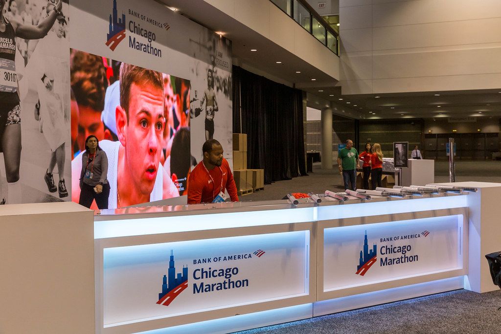 Bank of America Chicago Marathon staff at desk inside the North