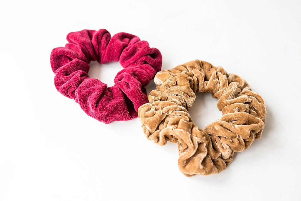 Beige and red scrunchies on white background (Flip 2019)