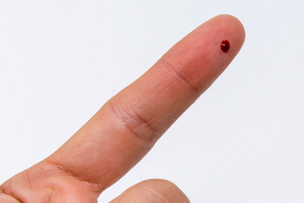 Blood Drop on Fingertip after puncture with Self-Test needle