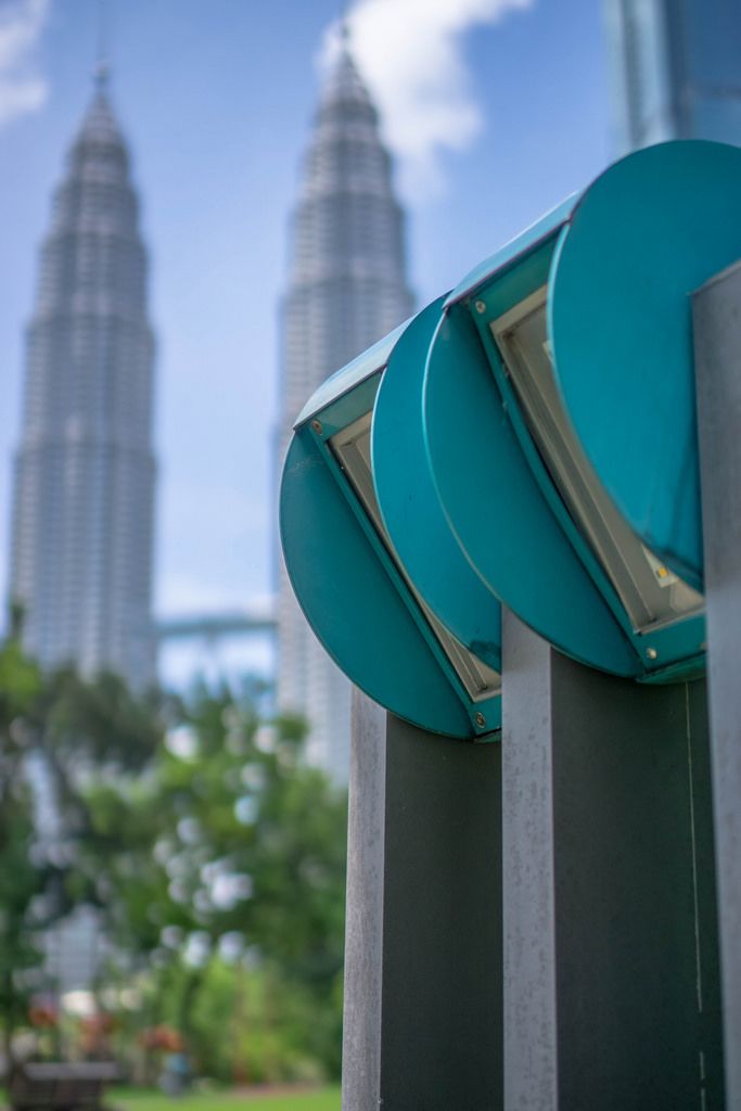 Bokeh Photo of Petronas Twin Towers from KLCC Park in Kuala Lumpur