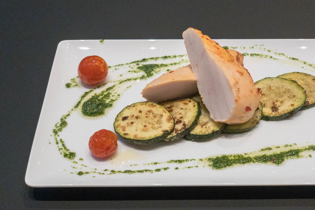 Chicken breast with grilled zucchini and cherry tomatoes