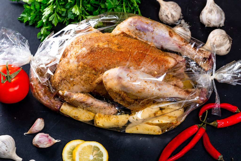 Chicken with spices and potatoes in the baking sleeve