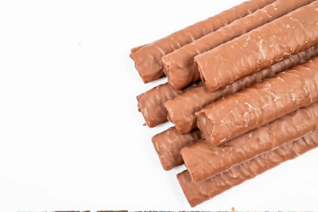 Chocolate Bars above white background with copy space