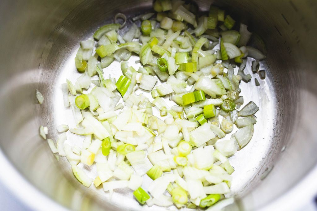Chopped onions in saucepan with olive oil