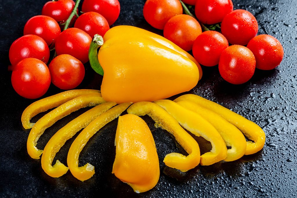 Chopped yellow pepper with branches of cherry tomatoes (Flip 2019) (Flip 2019) Flip 2019