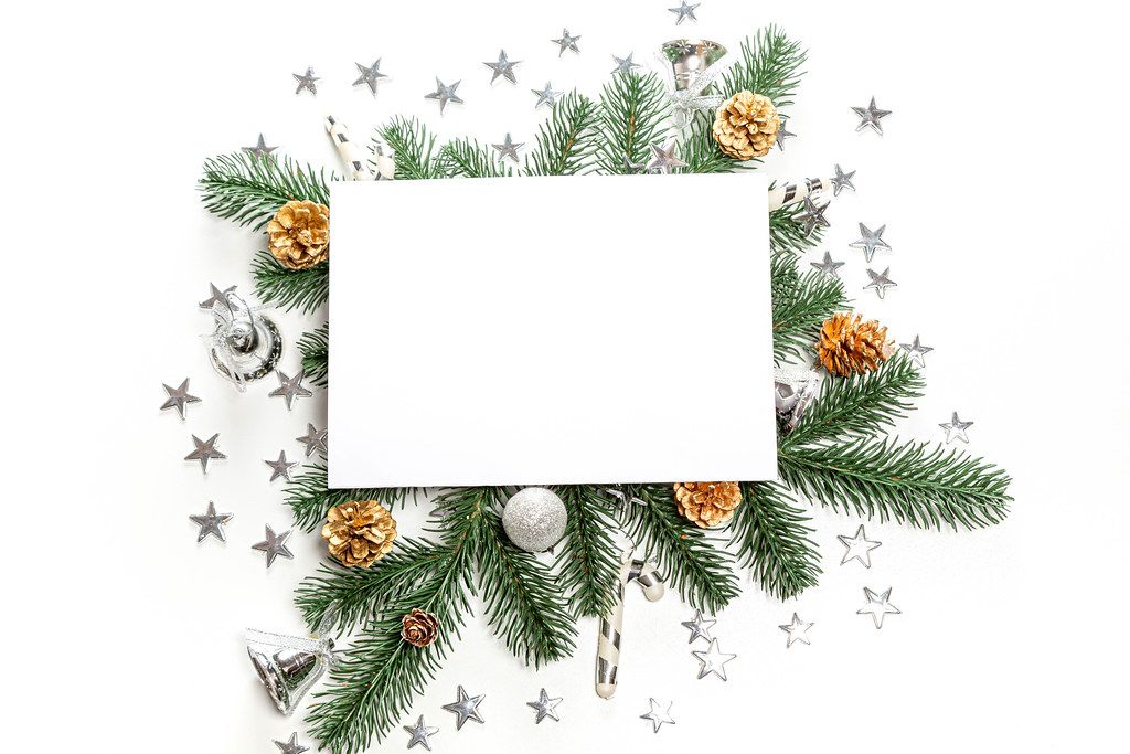 Christmas decor and tree branches background with free space in the middle