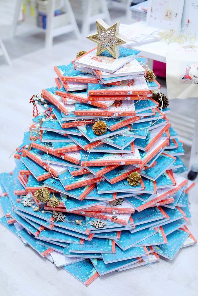 Christmas tree made of books, star on top