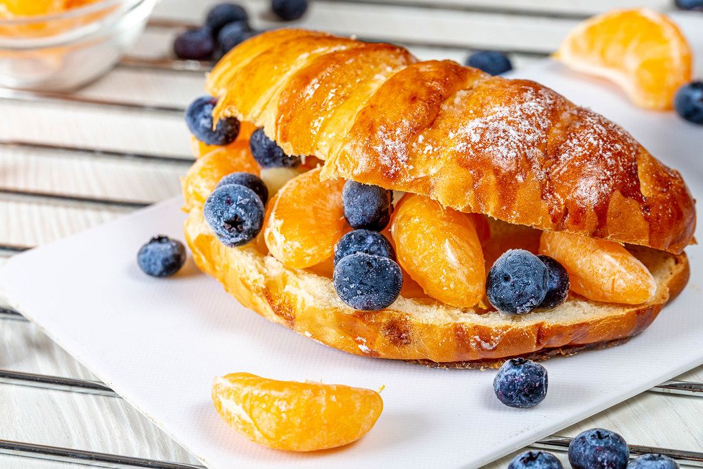Close-up fruit sandwich with tangerines and blueberries (Flip 2019 ...