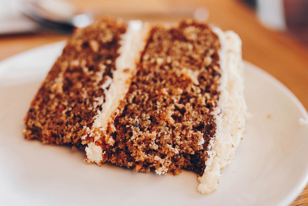 Close up of carrot cake with cream