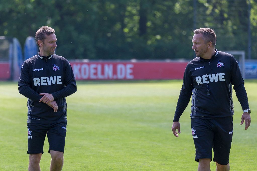 Close-up of new 1. FC Köln German soccer coach duo André Pawlak and Manfred Schmid after their first co-working training session