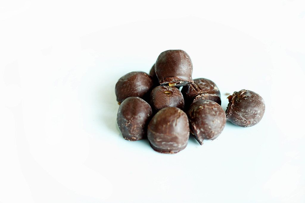 Close Up Photo of Chocolate Pralines on white Background