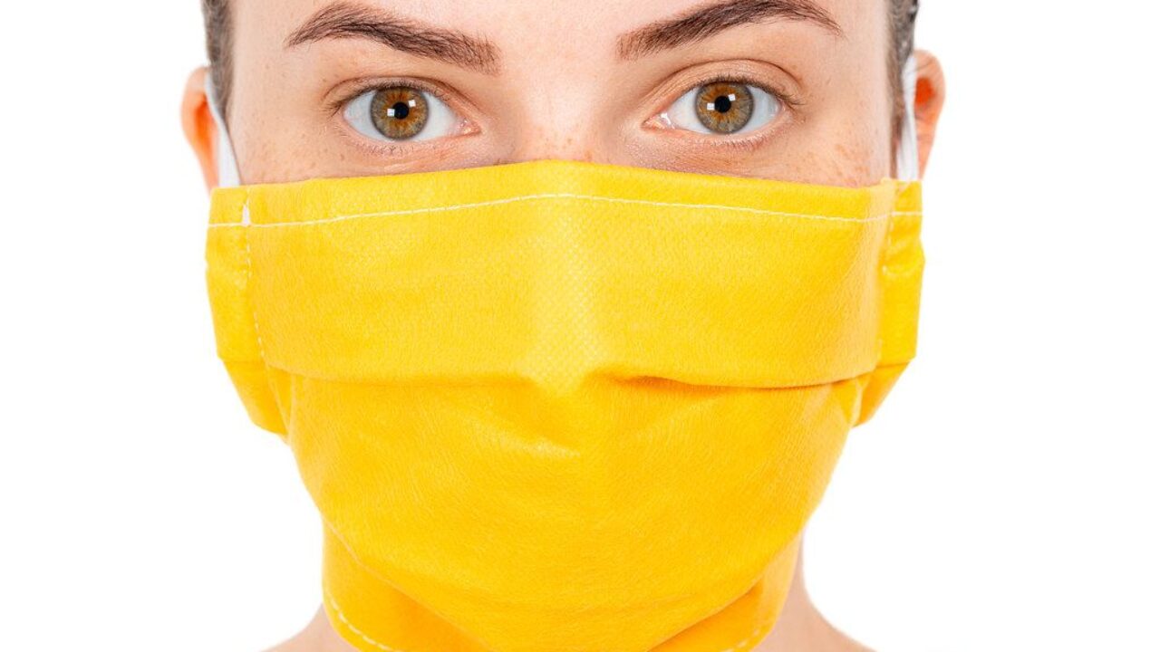 Download Closeup Young Girl Face In Yellow Medical Mask Creative Commons Bilder PSD Mockup Templates