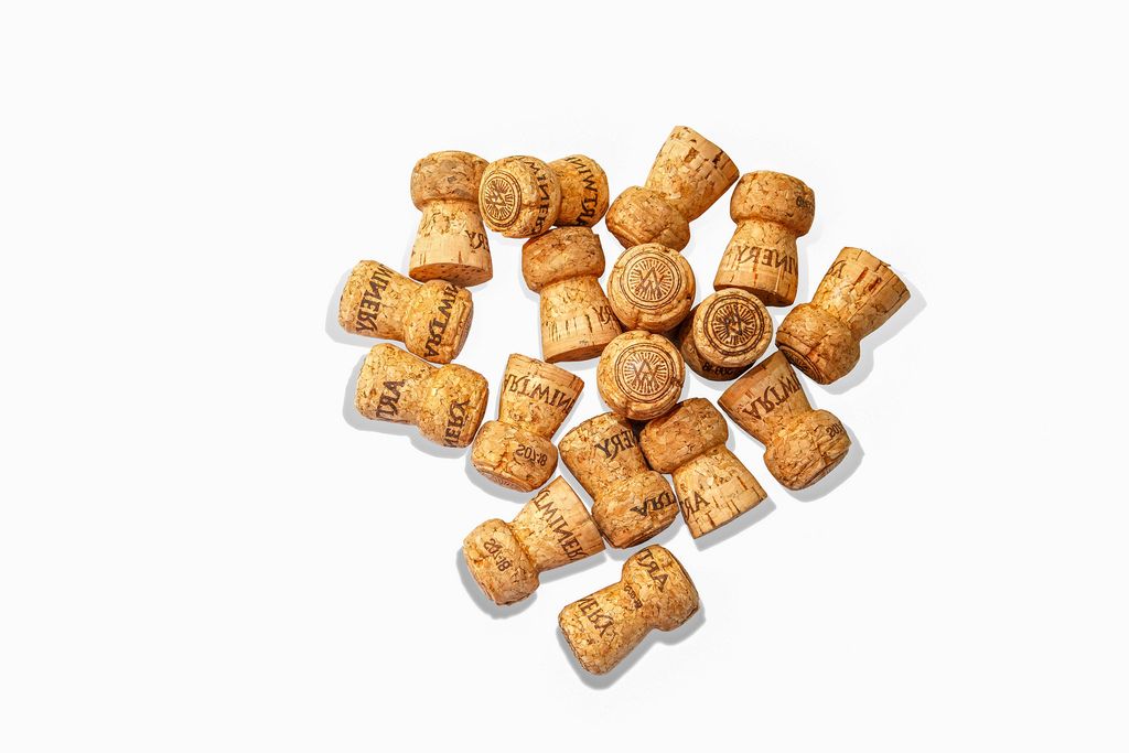 Corks from Champagne on white background (Flip 2019)