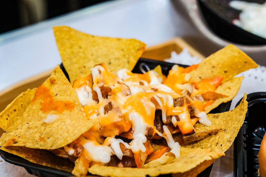 Cripsy nachos served with cheese and beef - Creative Commons Bilder