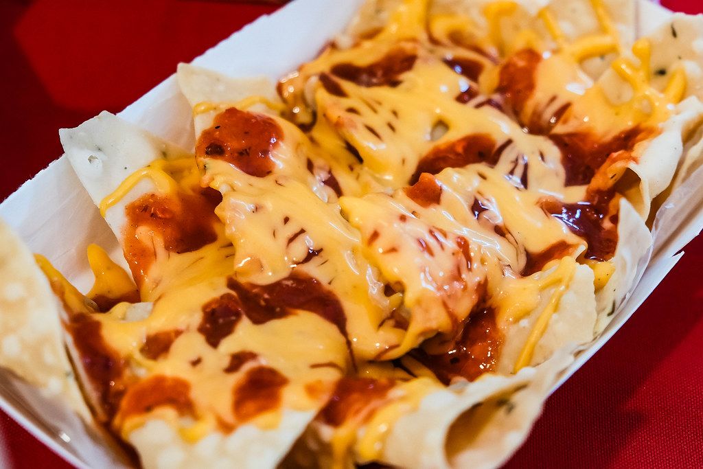 Crispy nachos covered in cheese and barbeque sauce - Creative Commons ...