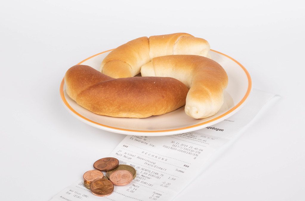 Croissants with reciept on white background