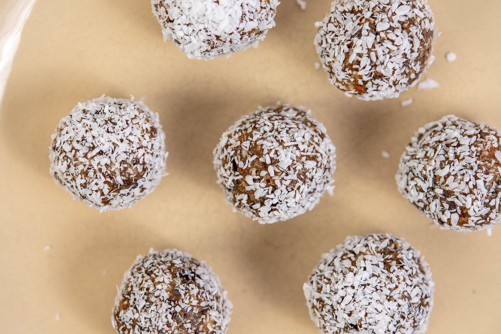 Dates and Peanut Butter energy balls in the Coconut