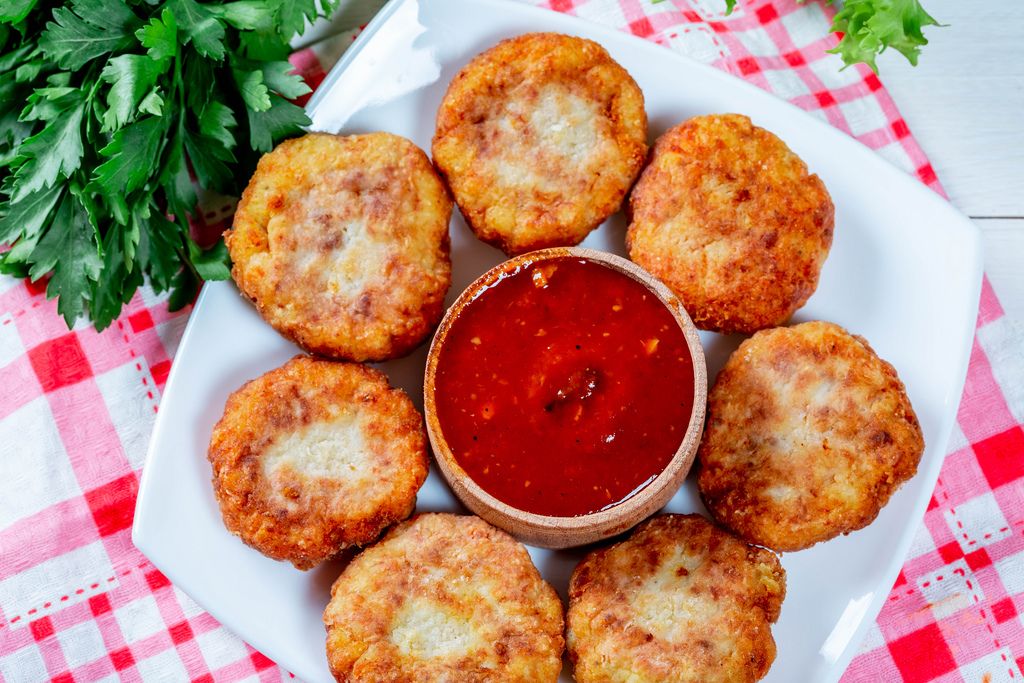 Delicious and healthy fish cutlets with homemade sauce