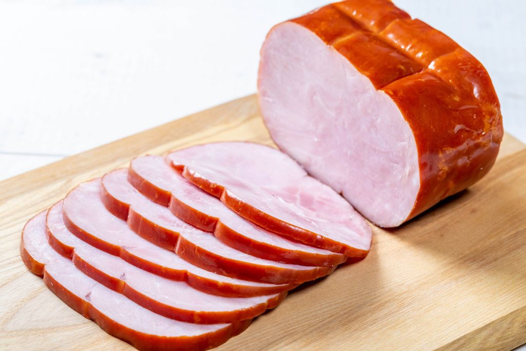 Delicious sliced ham on the kitchen Board