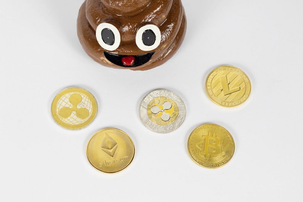 Different cryptocurrencies with poop toy
