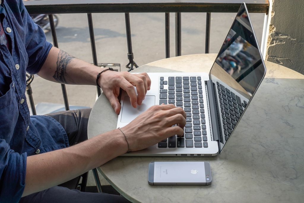 Digital Nomad working with a Laptop in a Cafe in Vietnam (Flip 2019) (Flip 2019) Flip 2019