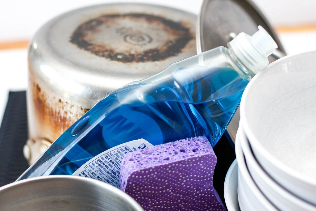 Dishes with Soap and Spong Close-up